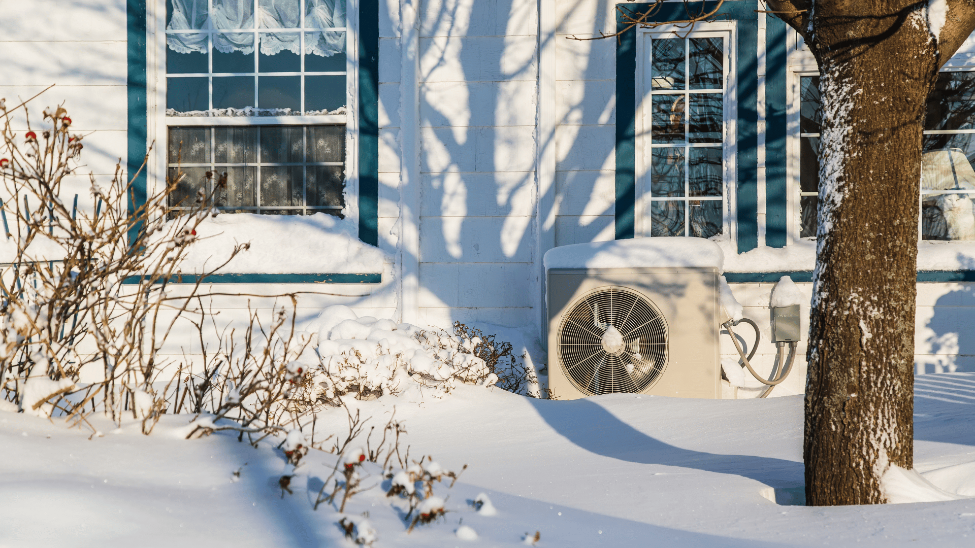 modern heat pump installed in winter